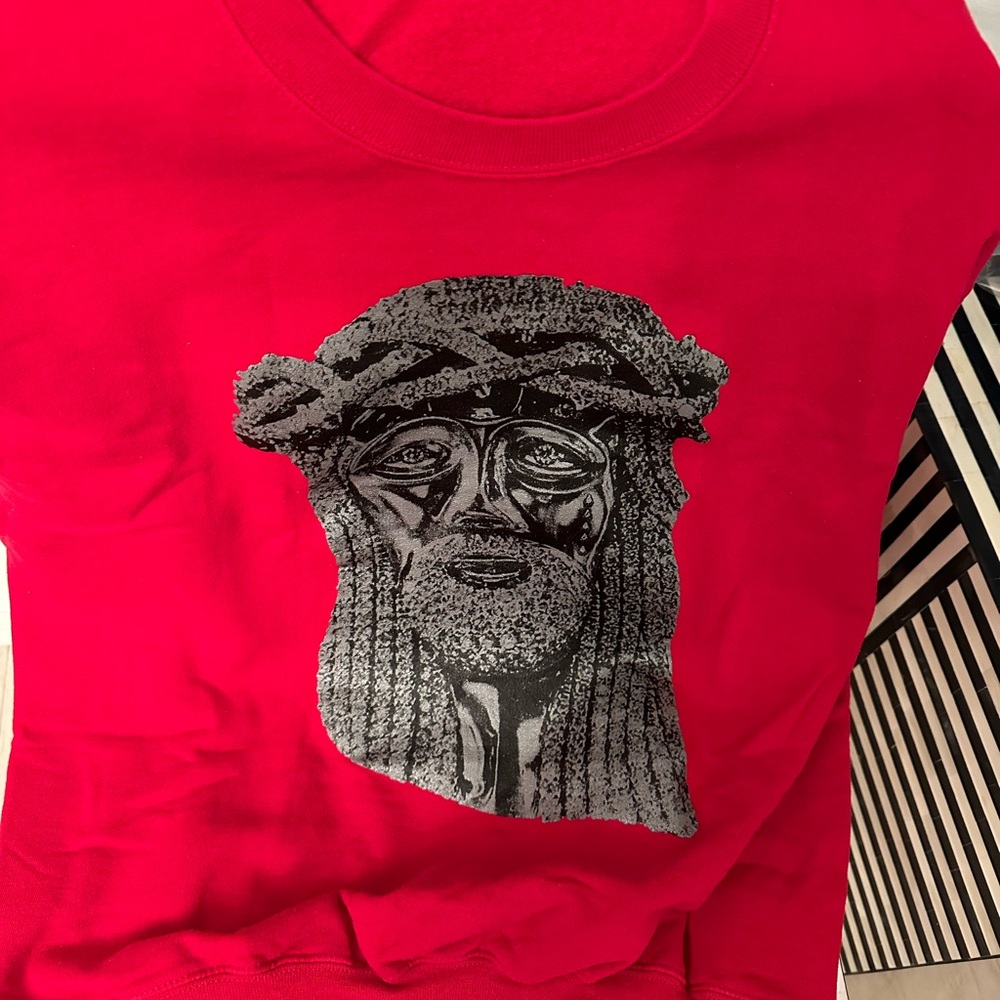 Red sweatshirt with jesus image